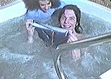 Tony has removed his trunks in the hot tub!